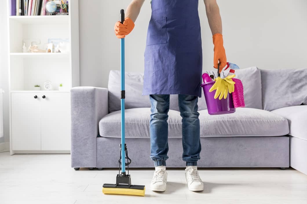 https://cleanwavecleaning.com/wp-content/uploads/2025/12/man-cleaning-his-home-1.jpg